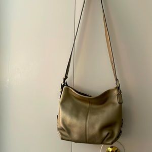 Coach Metallic Silver Duffel with Adjustable Strap. Perfect condition.